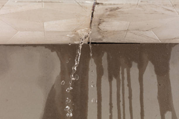Professional Sewage Cleanup technician working in Acton, MA
